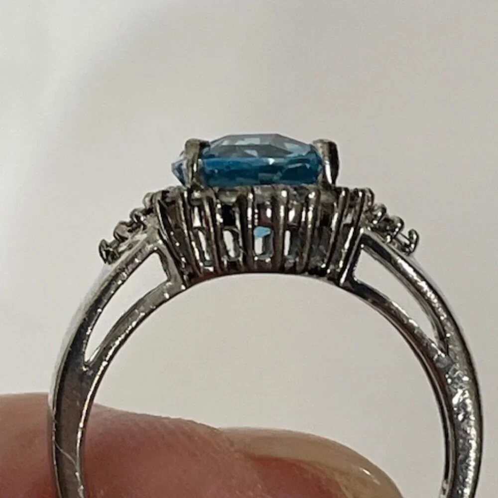Sterling silver and London blue topaz and moisonnite cocktail ring.